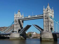 Tower Bridge London opening for tall ship to pass through. This shot is speeded up about 4 times normal. Stock Footage