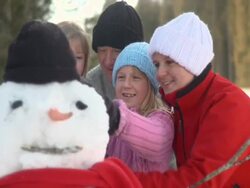 Making a snowman Stock Footage