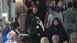 VOICED : Tehran bazaar blends hope caution a year after nuclear deal News Clip