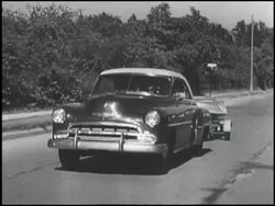 Montage: 1952 Chevrolet towing boat Stock Footage