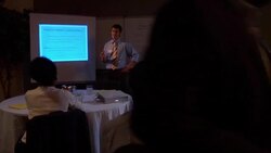 MS, PAN, Man giving presentation in conference room Stock Footage