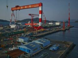 T/L cranes moving in the Oshima shipyard, Oshima, Japan Stock Footage