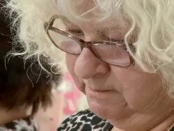 HD: Senior Woman Making Paper Flower Decoration Stock Footage