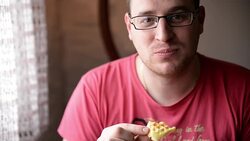 Man eating cookie Stock Footage