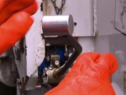 Gloved hands adjust the levers on a machine. Stock Footage