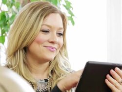 Young woman with digital tablet Stock Footage