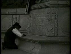 B/W Civil War veteran copies inscription on monument / Vicksburg, Mississippi / NO SOUND Stock Footage
