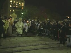 MS Priest carrying of holy symbol on easter parade at night AUDIO / Kerkyra, Corfu, Greece Stock Footage