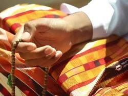 HD:Young muslim boy with rosary praying. Stock Footage