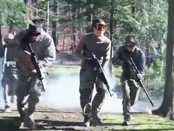 A military group practices a drill. - Slow Motion - Model Released - HD Stock Footage