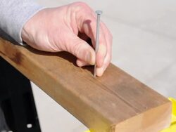 Hammering a nail Stock Footage