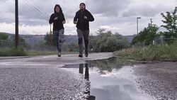 Physically Fit Caucasian Couple in their Thirties Running Stock Footage