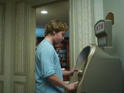 Young man freaking out at ATM machine Stock Footage