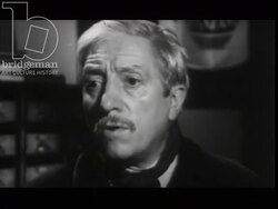 Colleagues laugh at an old man and his manager shouts at him. France, 1960 Stock Footage