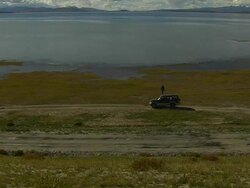Tilt Up Long Shot Stretch of Mansarovar Lake Lhasa Tibet China Stock Footage