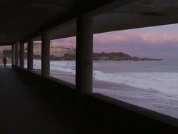 MS View of People jogging in beach and Breaking waves / Biarritz, PyrÃŒÂ©nÃŒÂ©es Atlantique, France Stock Footage