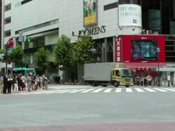 T/L, Traffic and pedestrians at Shibuya Crossing, Tokyo, Japan Stock Footage
