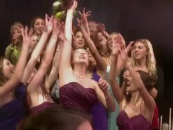 Brides throws her bouquet for waiting ladies to catch Stock Footage