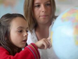 Classroom Teacher and Schoolgirl Stock Footage