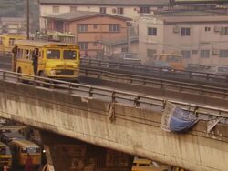 MS Market cross bridge with cars / Lagos, Nigeria Stock Footage