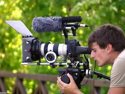 cameraman is shooting video Stock Footage