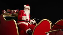 Father Christmas driving his sleigh Stock Footage