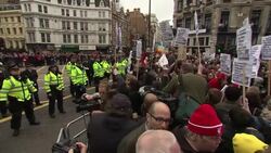 Protesters in crowd turn their backs on Thatcher's coffin News Clip