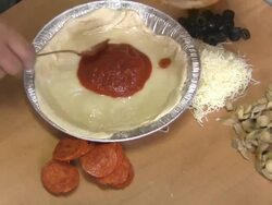 making a small pizza Stock Footage