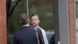 Business owner meets financial advisor outside of restaurant Stock Footage