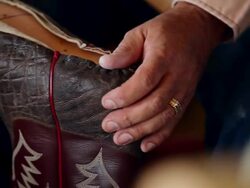 CU PAN TU TD boot maker using screwdriver to stretch vamp over sole of cowboy boot Stock Footage
