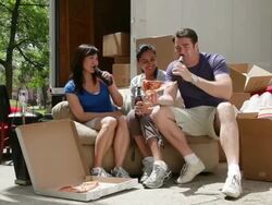MS Friends having pizza after unloading moving truck / Newark, New Jersey, United States Stock Footage