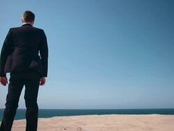 Businessman in desert Stock Footage
