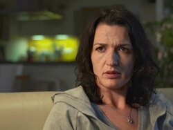 HD DOLLY: Unhappy Woman Watching TV Stock Footage