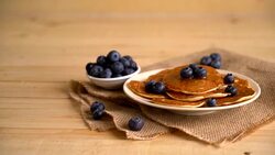 Stack of pancakes with fresh blueberry Stock Footage