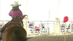 Children and adults in horseback shooting contest News Clip