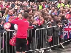 Lewis Hamilton is the first torch relay runner as Stock Footage