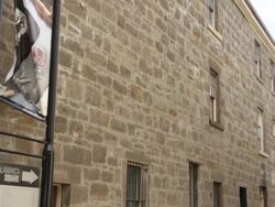 Tilt down from Salamanca sign to terraces          Stock Footage