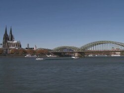 WS View of Rhine river Hohenzollern Bridge and Cathedral / Cologne, North Westphalia, Germany Stock Footage