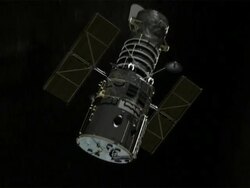 WS TS View of Hubble Space Telescope as it swoops past, Sun and then Earth, Post 2002 version of Telescope Stock Footage