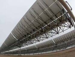 Low Angle static , Solar panels rotate nearly 360 degrees. / California Stock Footage