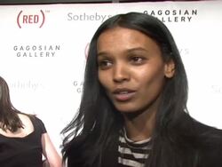 Bono and Damien Hirst Paint the Town Red For Aids In Africa - The (RED) Auction Stock Footage