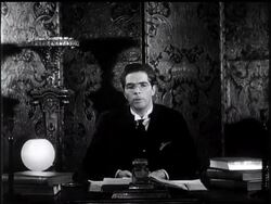 Eminent Scientist Takes Look At 1933 News Clip