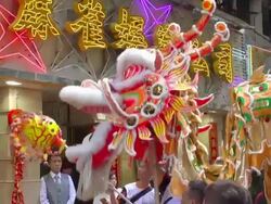 MS PAN TD Lion dance performance on street on Chinese New Year AUDIO / Hong Kong, Special Administrative Region, China Stock Footage