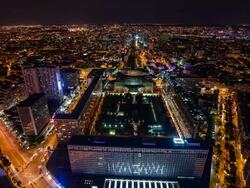 High view on Montparnasse train station and Paris at night Stock Footage