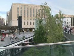 WS PAN Traffic in 9th avenue and people strolling in Highline Park / New York, New York, United States Stock Footage