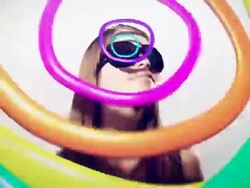 Young woman dancing surrounded by pop colorful 3D shapes Stock Footage