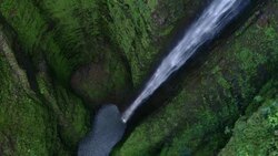 Aerial view of Kaluanui Falls in Oahu's Sacred Falls State Park, looking straight down. Stock Footage