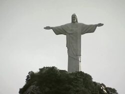 Mid shot of Christ the Redeemer [Cristo Redentor] on bright cloudy day, Rio de Janeiro, Brazil [Brasil] Stock Footage
