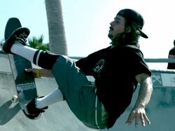 MS SLO MO Shot of skateboarder riding up bowl, bailing, and falling / Venice, California, United States Stock Footage