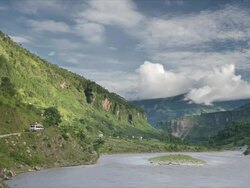 T/L Tatopani Lake and clouds, Himalayas Stock Footage